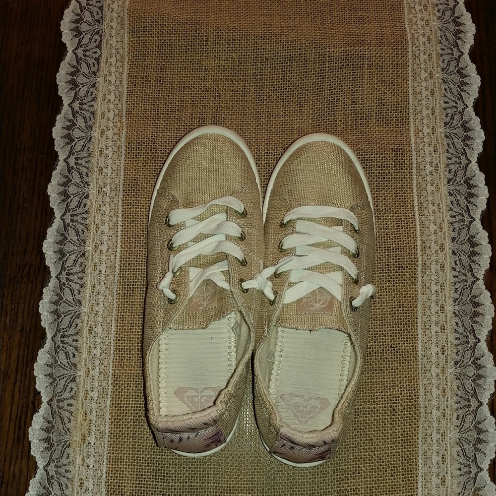 Gold Roxy bayshore slip on shoe.